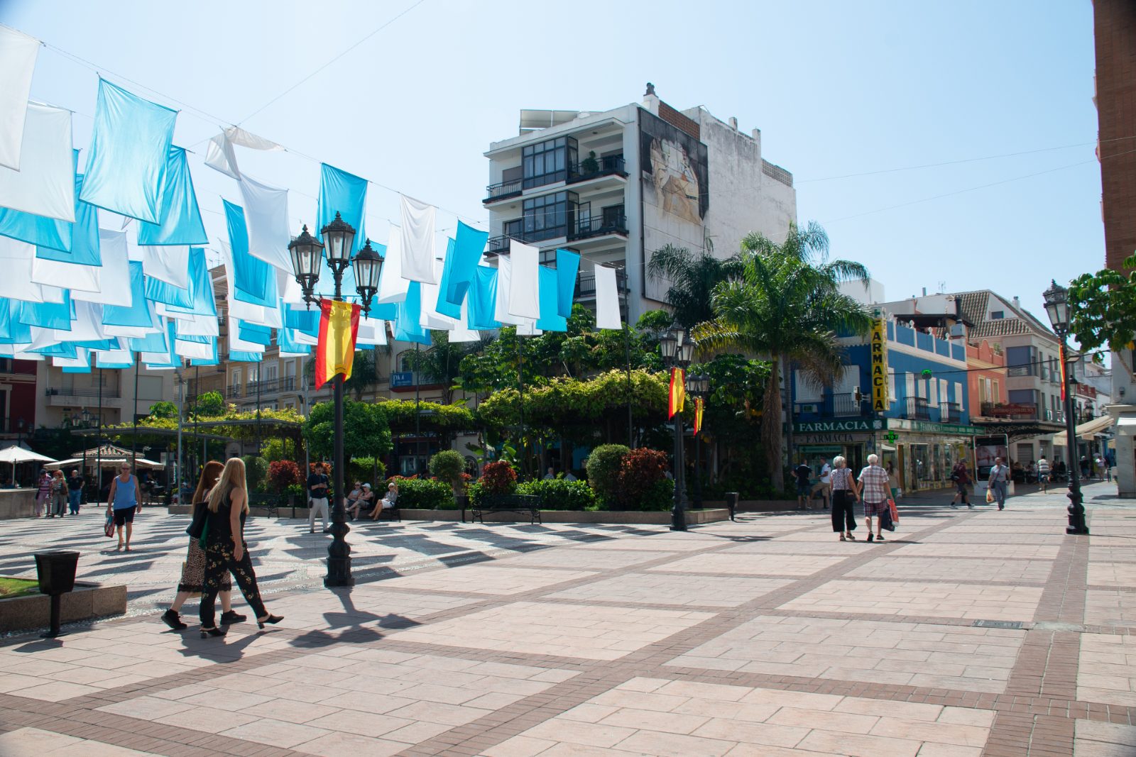 Plaza de la Constitución in Fuengirola with blue and white bunting strung across the square